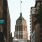 a city street with tall buildings