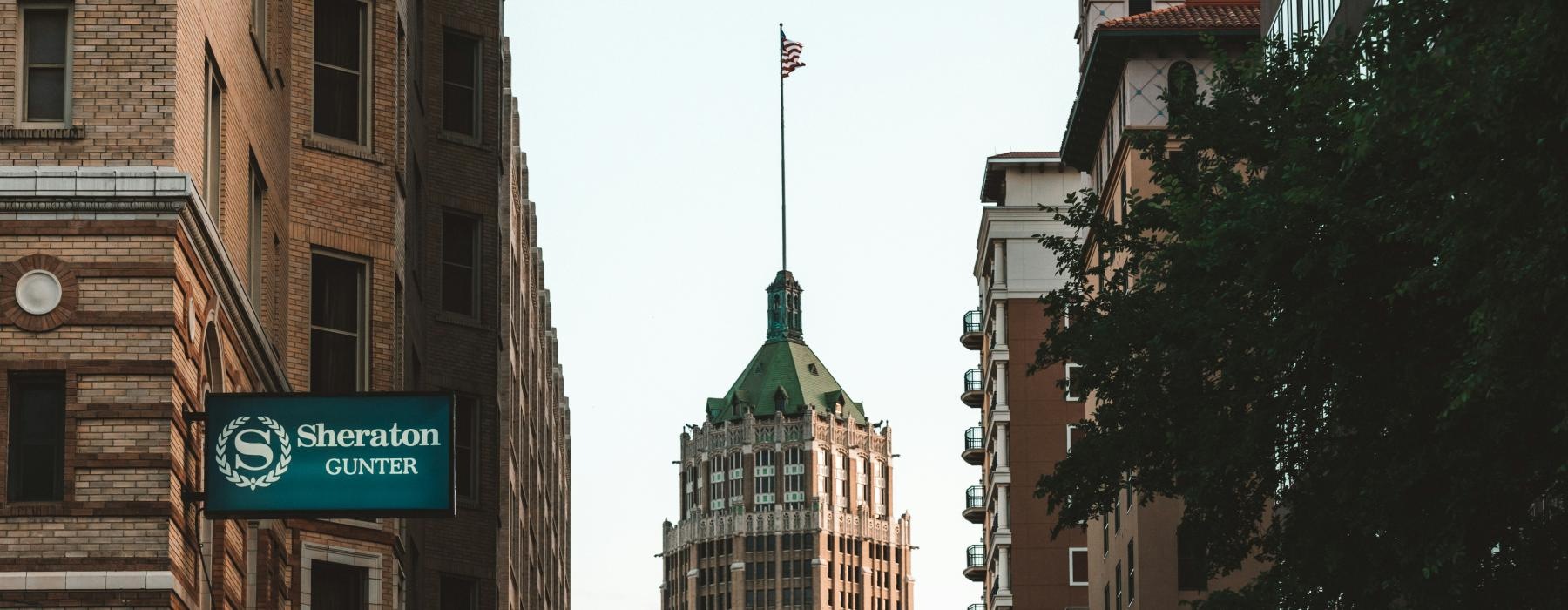 a city street with tall buildings